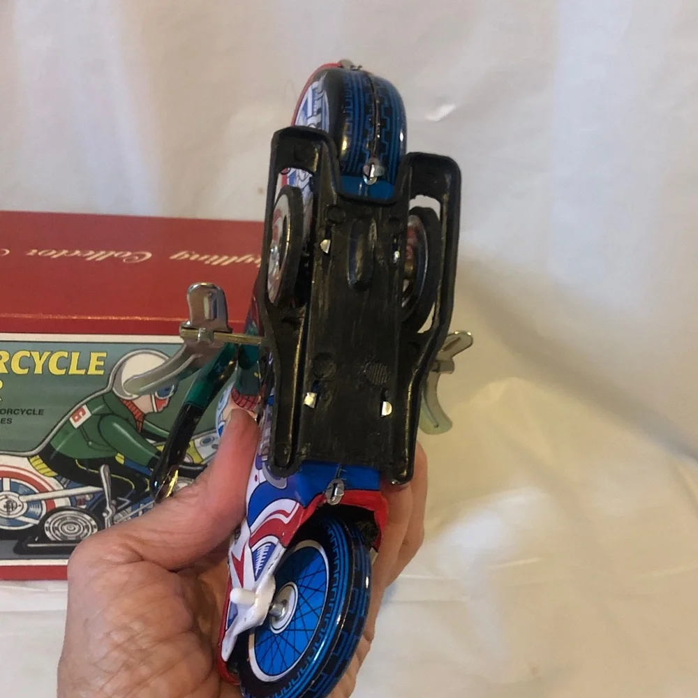 Motorcycle Racer wind up pressed tin new old stock mint condition 7.5” long
